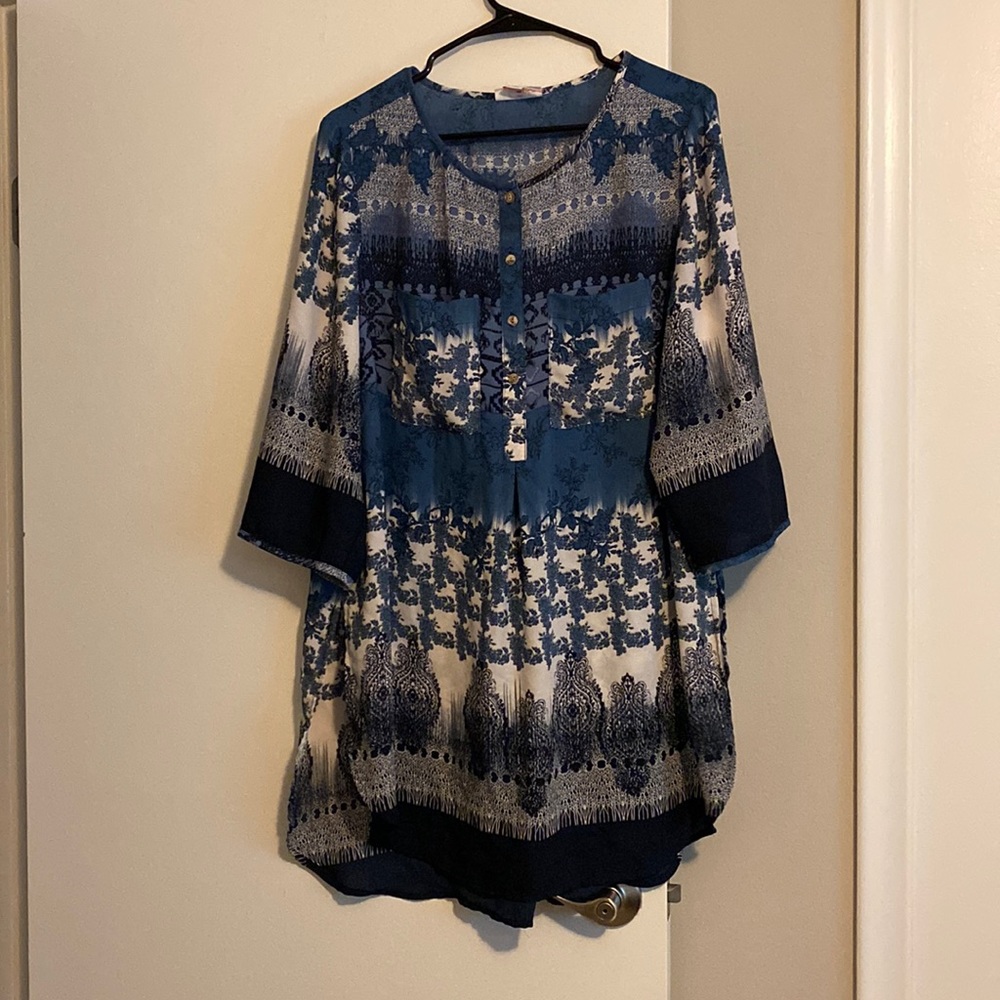 Light and flowing blue blouse in a size 1X
